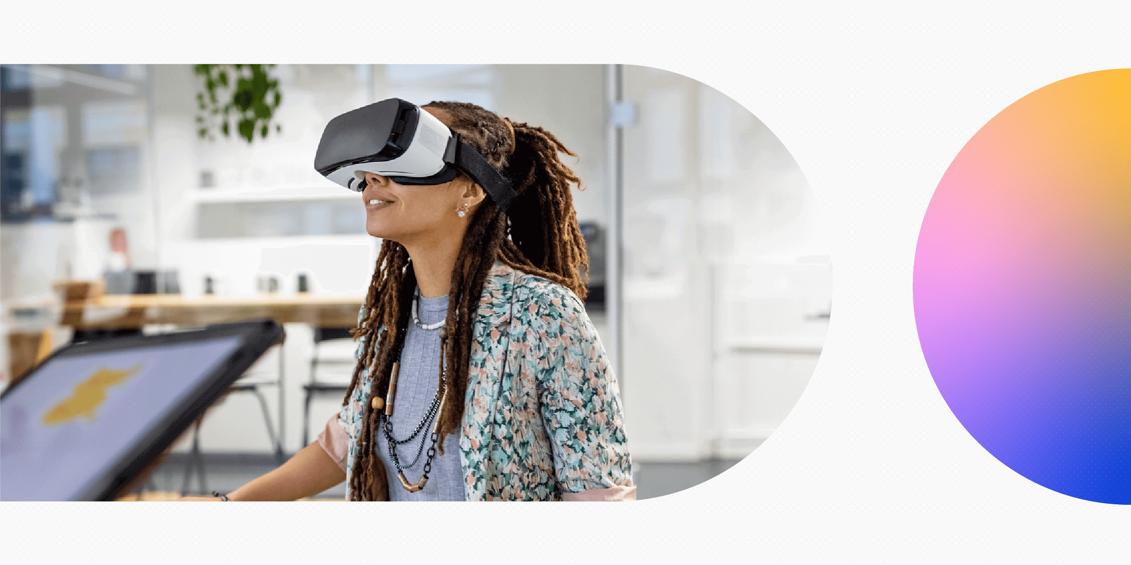 Woman wearing a VR headset, engaging with virtual content.